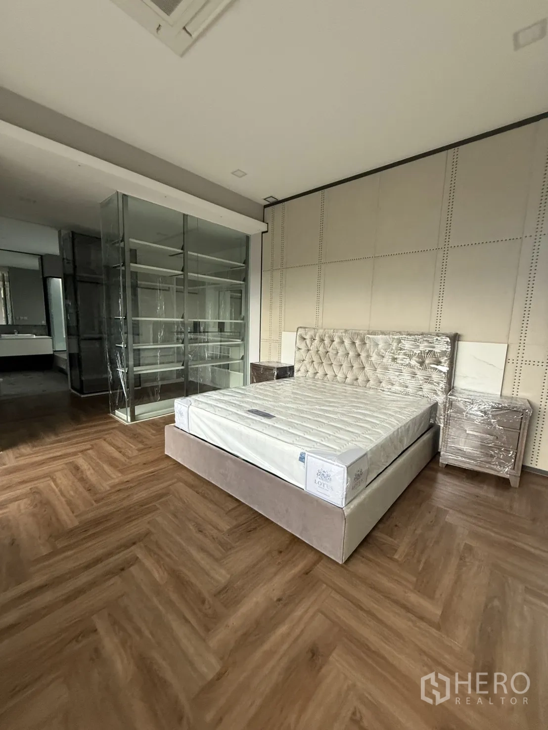 Detached House for rent in Saphan Sung, Bangkok - Master bedroom with glass walk-in closet and ensuite beyond.