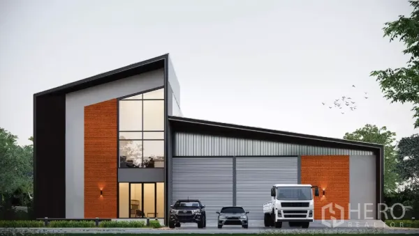 Factory for sale in Bang Bo, Samut Prakan - Modern factory exterior in Bang Bo with two-storey glass-front office, brick accents and wide roller shutters, with truck and car parking.