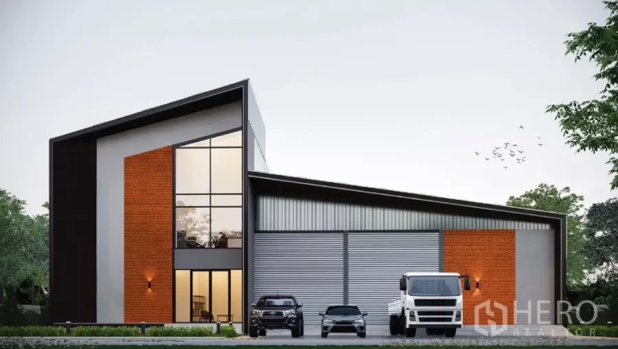 Factory for sale in Bang Bo, Samut Prakan - Modern factory exterior in Bang Bo with two-storey glass-front office, brick accents and wide roller shutters, with truck and car parking.