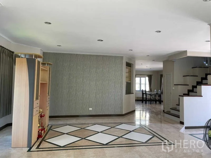 Detached House for sale in Bang Bon, Bangkok - Open-plan living area with tiled floors and a built-in cabinet
