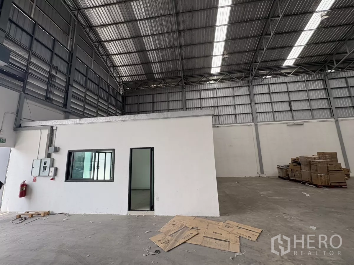 Warehouse for rent in Bang Phli, Samut Prakan - Close view of the internal office module with window and electrical panels.