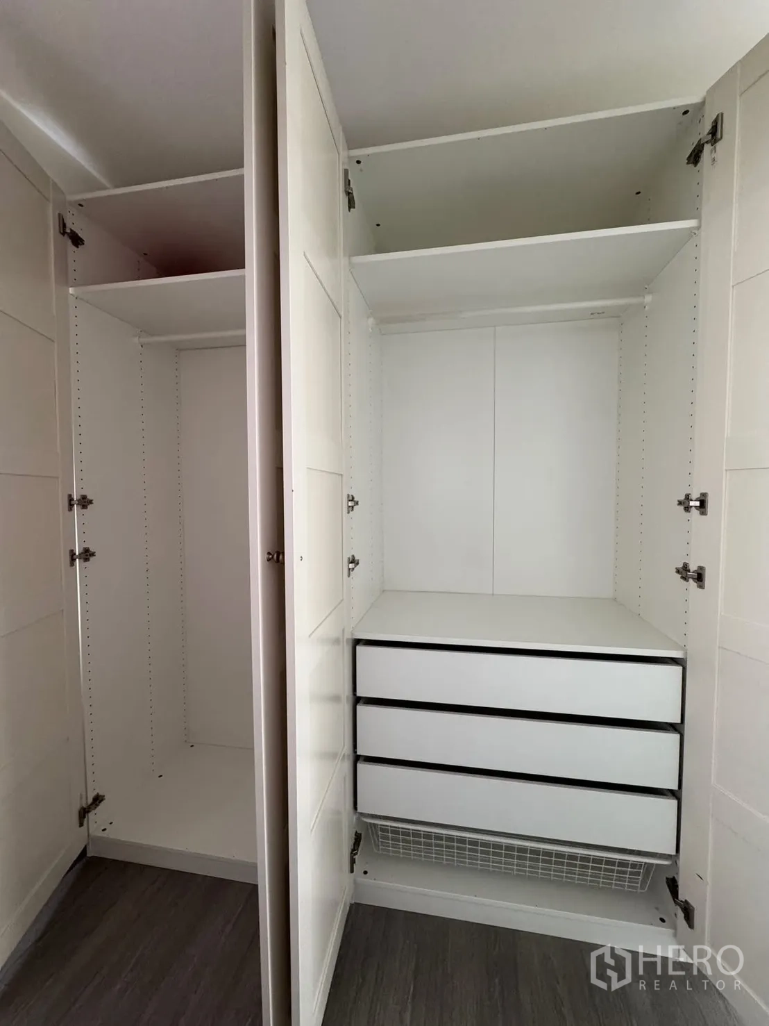 Detached House for rent in Bang Phli, Samut Prakan - Built-in white wardrobe with shelves and drawers open for storage.