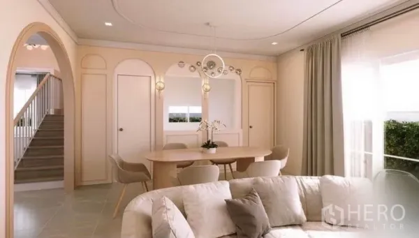 Detached House for rent in Bang Phli, Samut Prakan - Open-plan living and dining room with arched wall details, oval table and modern pendant lights.