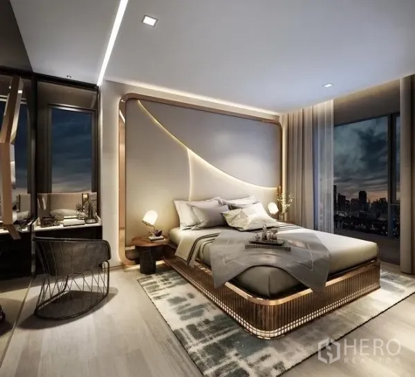 คอนโด ขายในRatchathewi, Bangkok - ห้องนอนมาสเตอร์ดีไซน์โมเดิร์น ผนังหัวเตียงเด่น พร้อมวิวสกายไลน์