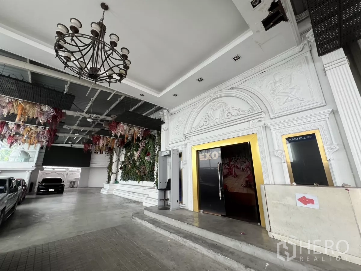 Retail Space for rent in Watthana, Bangkok - Ornate entrance with chandelier and white classical facade doors.