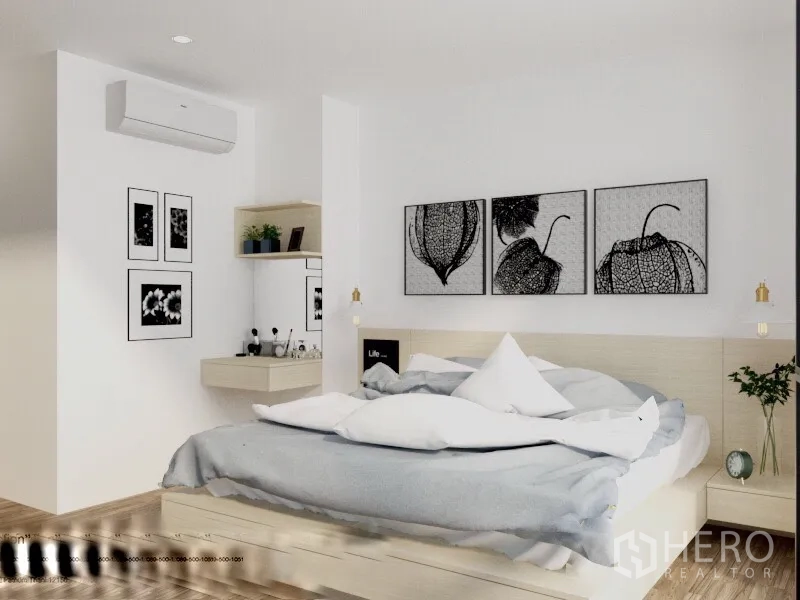 Condominium for rent or sale in Watthana, Bangkok - Spacious bedroom with platform bed, pendant bedside lights, and modern black-and-white artwork.