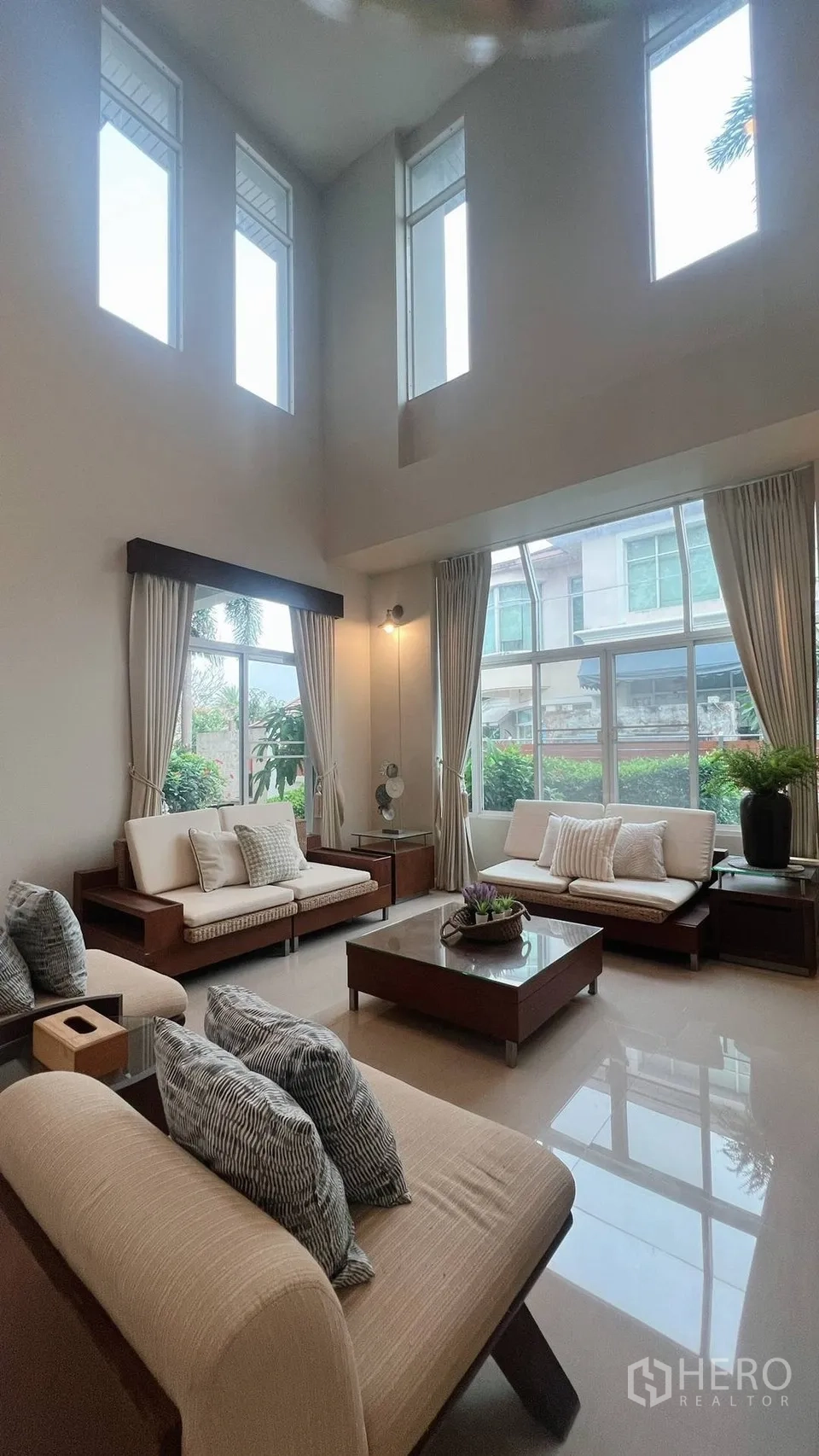 Detached House for rent in Lat Krabang, Bangkok - Open-plan living area connected to dining and garden patio.