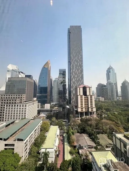 Condominium for rent - High-rise cityscape and park outlook from the condominium window.