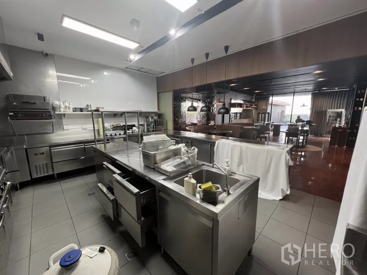 Retail Space for rent - Open kitchen island and pass through to the dining area.