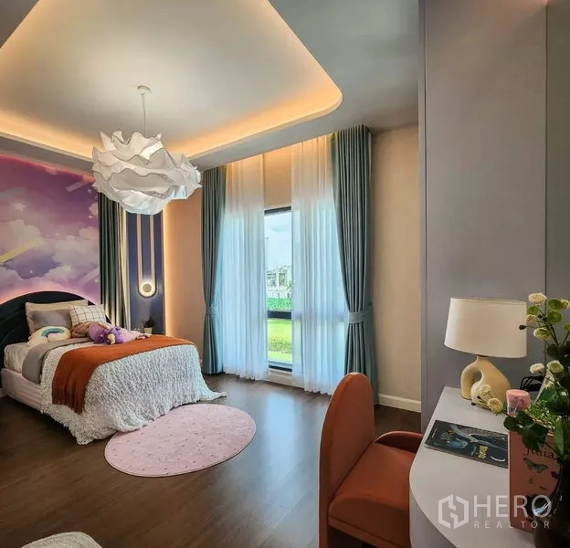 Detached House for sale in Bang Phli, Samut Prakan - Bright bedroom with cloud mural, full-height curtains, desk and garden view.