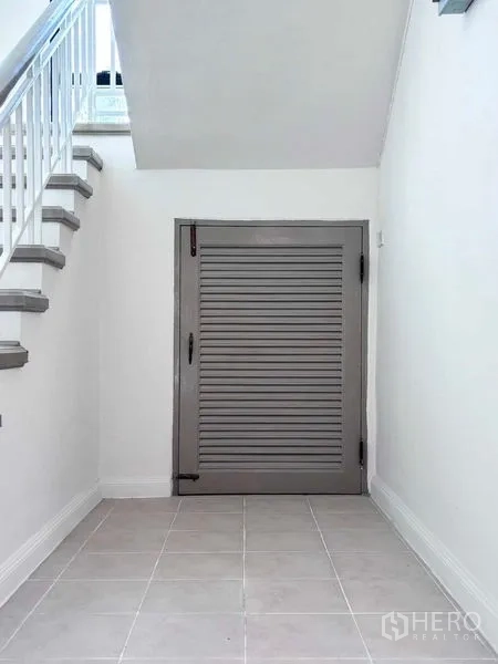 Detached House for rent or sale - Under-stair storage area with louvered door.