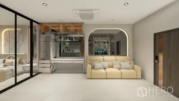 公寓 出租在Sathon, Bangkok - 开放式起居区，米色沙发、工作台与拱形灯光装饰。