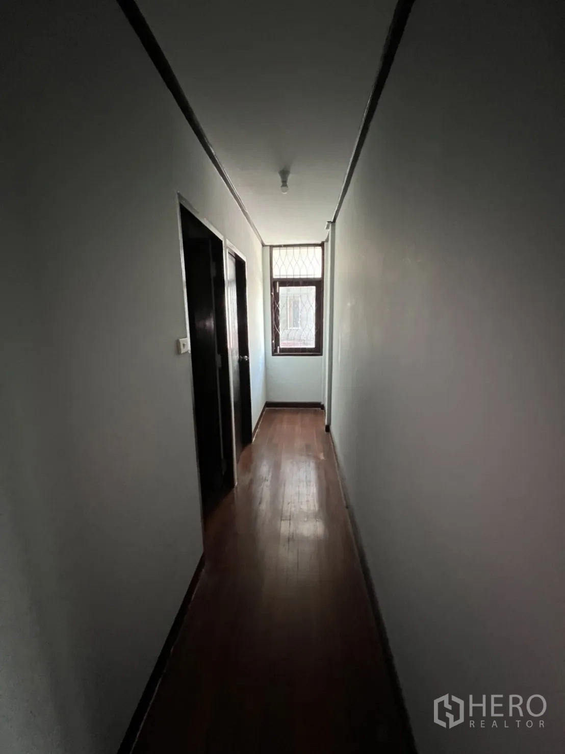 Home Office for rent in Watthana, Bangkok - Another compact restroom with toilet and white tiles.