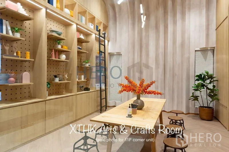 Condominium for rent or sale - Arts and crafts room with wooden shelves and communal table.