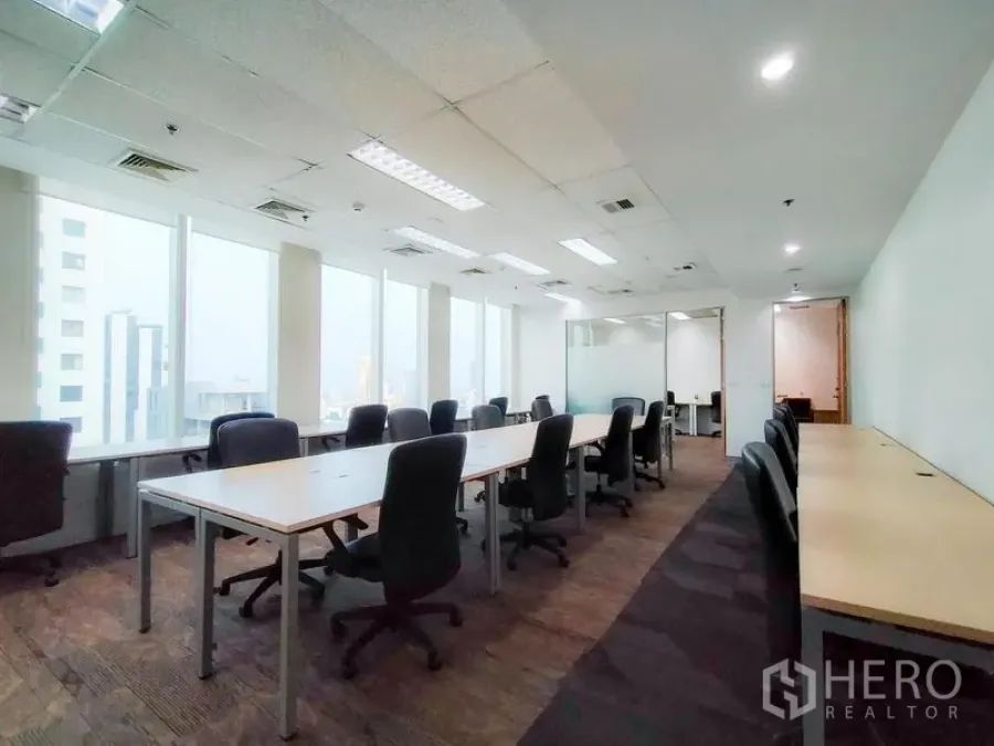 Office Space for rent in Khlong Toei, Bangkok - Large office area with glass-partition meeting room and panoramic windows.