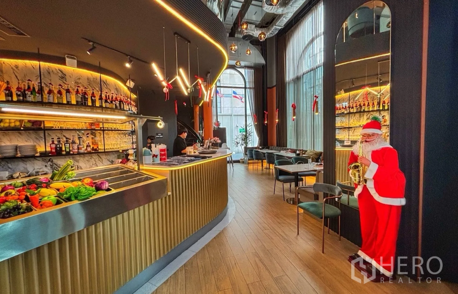 Retail Space for rent in Bang Rak, Bangkok - Contemporary bar counter with backlit shelves, marble backsplash, and modern lighting.