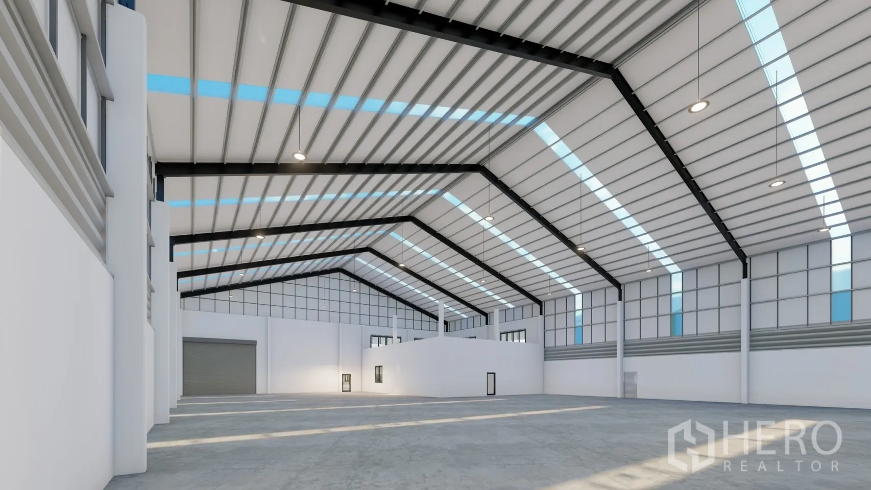 Factory for rent or sale in Lam Luk Ka, Pathum Thani - Wide interior view of open warehouse showing roller shutter and bright skylight bands.