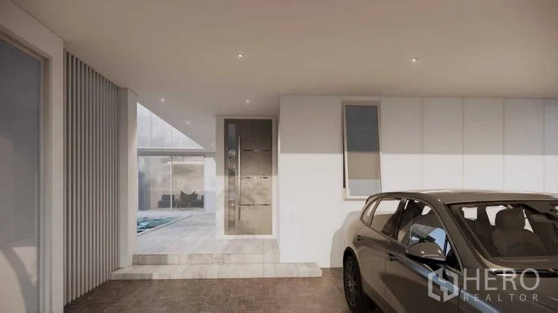 ที่ดิน ขายในPrawet, Bangkok - ทางเข้าพร้อมที่จอดรถในร่ม เชื่อมสู่ประตูกระจก โดยมีสระอยู่ด้านใน.