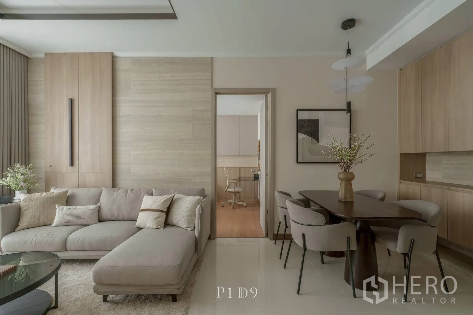 Condominium for rent in Watthana, Bangkok - Open-plan living and dining area leading to a separate bedroom.
