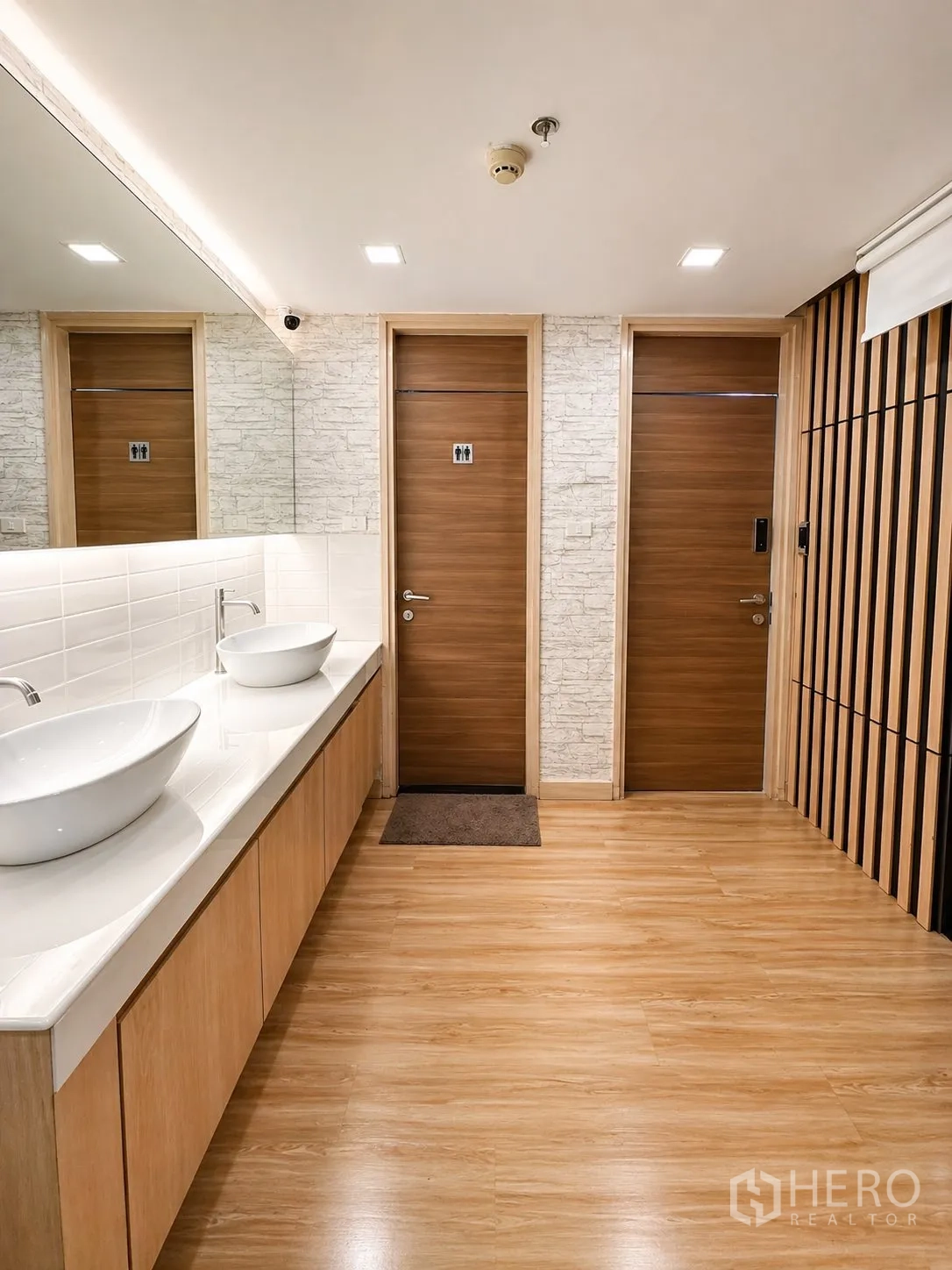 Home Office for rent or sale in Yan Nawa, Bangkok - Restroom corridor with double sinks and separate men and women doors.