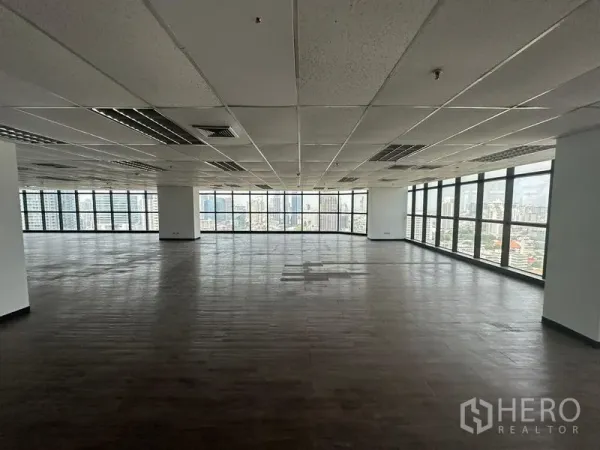 Office Space for rent - Open workspace with wide windows, abundant natural light and cityscape panorama.