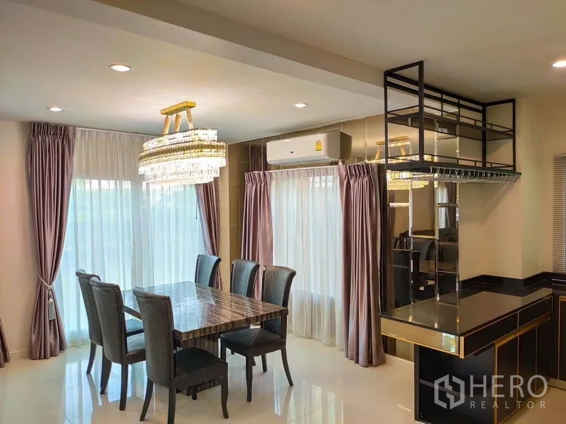Detached House for rent - Bright dining area with marble table, crystal chandelier and full-length curtains
