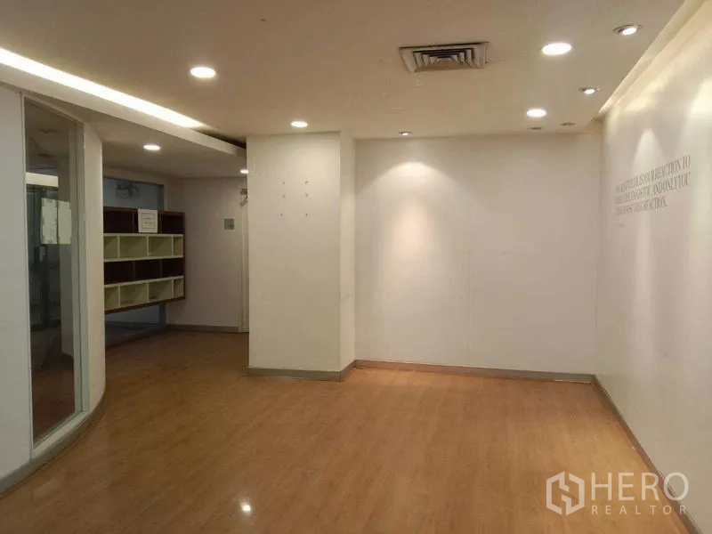 Office Space for rent in Watthana, Bangkok - Lobby or waiting area with wood flooring, recessed lighting and clean white walls.