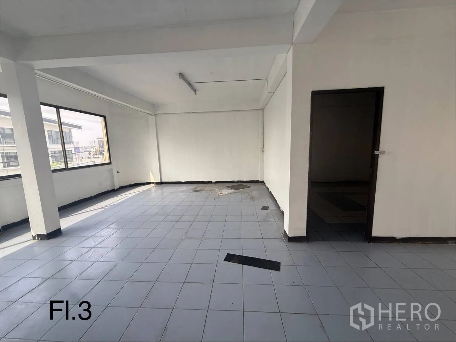 Shophouse for rent in Bang Na, Bangkok - Third-floor open area from another angle showing abundant natural light through wide windows.