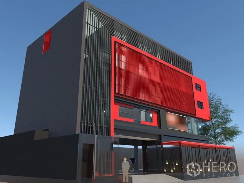 零售空间 出售在Khlong Toei, Bangkok - 红黑配色的现代商业建筑立面与门禁入口。