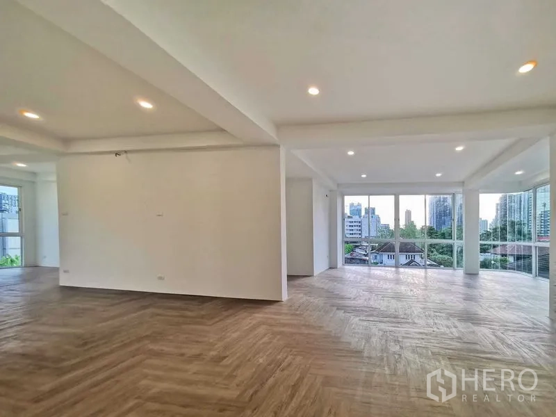 Home Office for sale in Suan Luang, Bangkok - Open-plan level with large windows and city outlook.